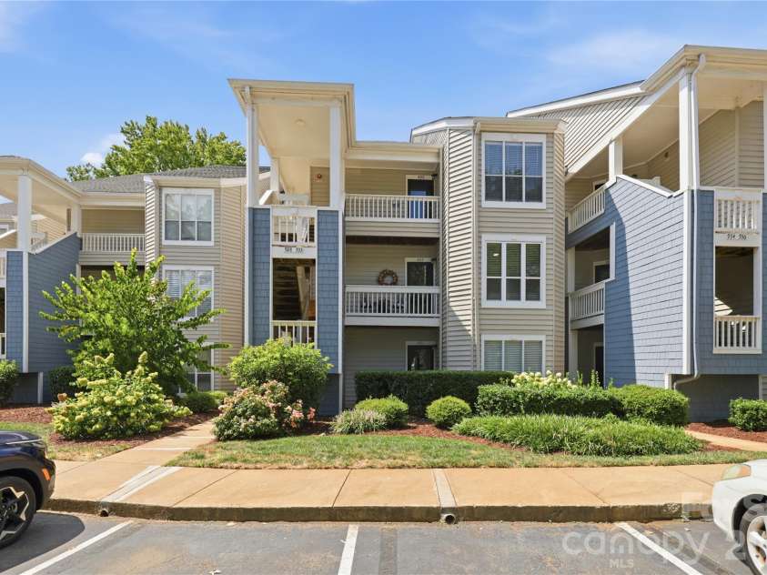 932 Southwest Drive, Davidson, NC 28036.  MLS# CAR4414444, YatesRealty ID 47906. Recreation trails wind through the attractive lakeside setting.
