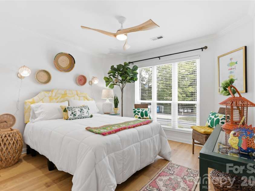 932 Southwest Drive, Davidson, NC 28036.  MLS# CAR4414444, YatesRealty ID 47906. Two-bedroom, two-bath floor plan offering, serene views, separation and privacy.