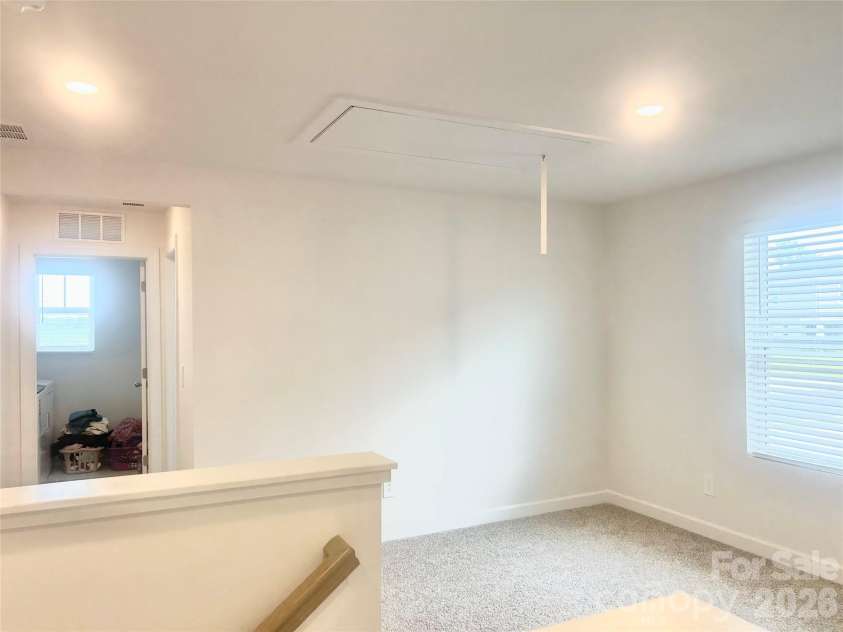 5021 Poplin Valley, Cherryville, NC 28021.  MLS# CAR4419741, YatesRealty ID 47918. Loft area between bedrooms