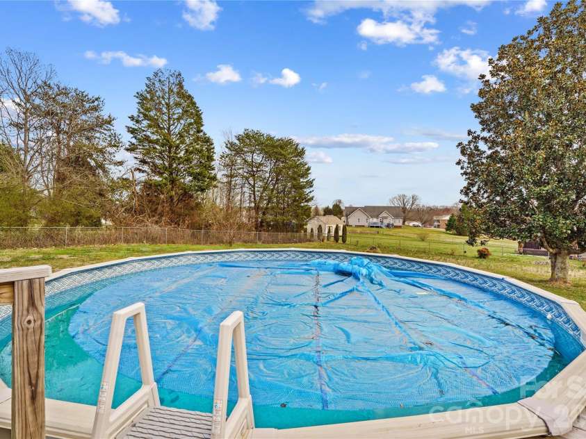 158 Rumple Hill Drive, Statesville, NC 28677.  MLS# CAR4355841, YatesRealty ID 4792. Pool
