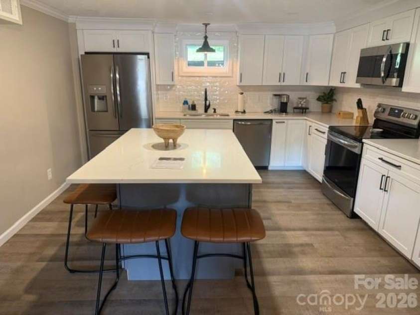 150 Shady Cove Drive, Troutman, NC 28166.  MLS# CAR4419626, YatesRealty ID 47923. Kitchen island