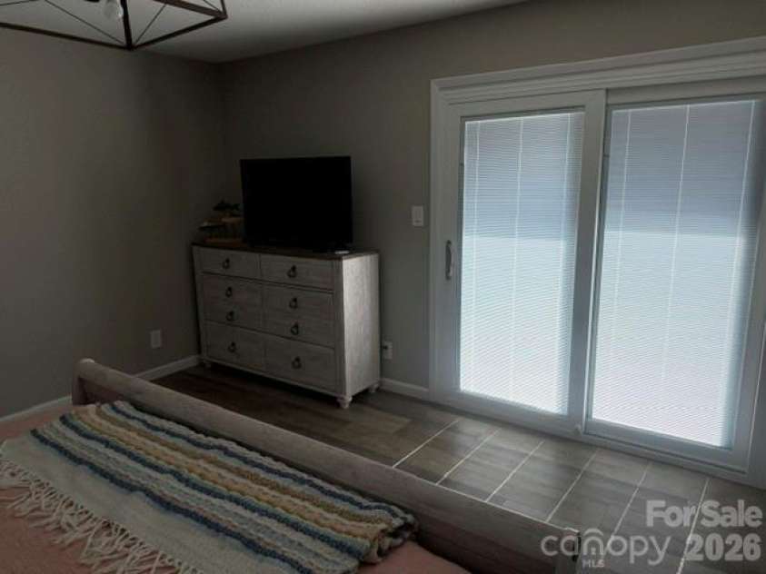 150 Shady Cove Drive, Troutman, NC 28166.  MLS# CAR4419626, YatesRealty ID 47923. Upper Level Bedroom 2