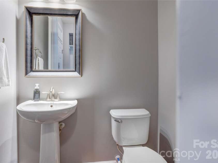 255 Perennial Drive, Concord, NC 28027.  MLS# CAR4417851, YatesRealty ID 47934. Half bath on first level