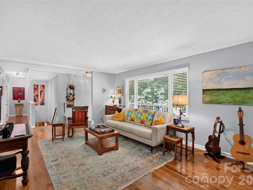 42 Timothy Lane, Candler, NC 28715.  MLS# CAR4419868, YatesRealty ID 47953. Comfortable living room space