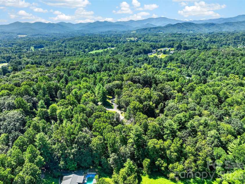 42 Timothy Lane, Candler, NC 28715.  MLS# CAR4419868, YatesRealty ID 47953. Drone views show it's not a long way to + 5000' in elevation