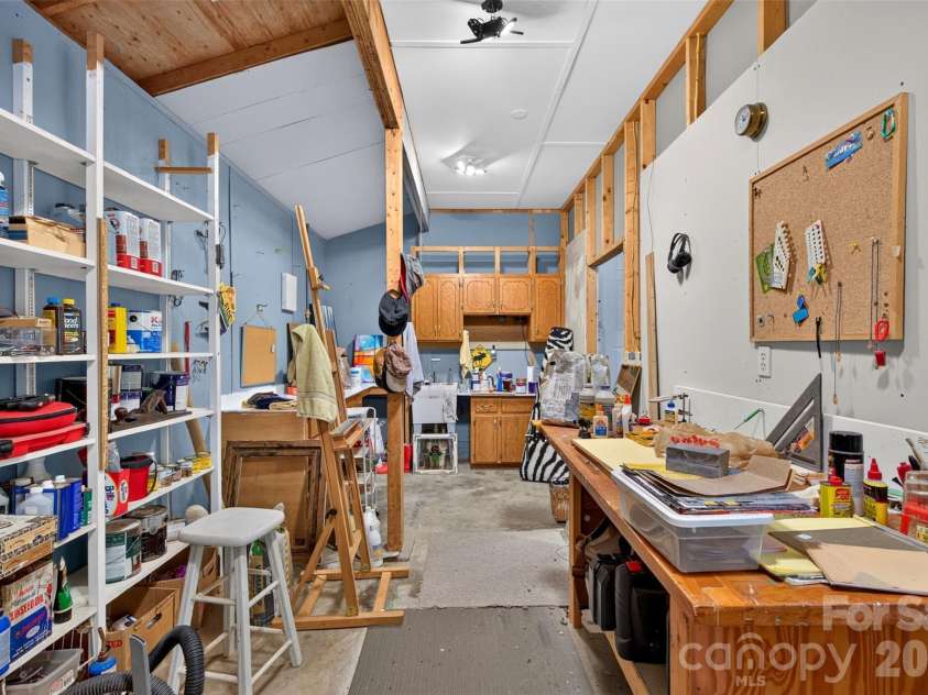 42 Timothy Lane, Candler, NC 28715.  MLS# CAR4419868, YatesRealty ID 47953. Garage workshop includes a 240 volt dedicated circuit