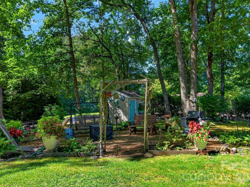 42 Timothy Lane, Candler, NC 28715.  MLS# CAR4419868, YatesRealty ID 47953. Grilling / entertaining area