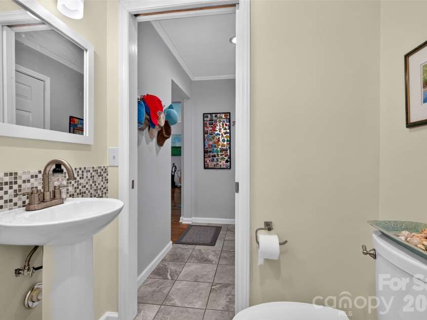 42 Timothy Lane, Candler, NC 28715.  MLS# CAR4419868, YatesRealty ID 47953. Half bathroom