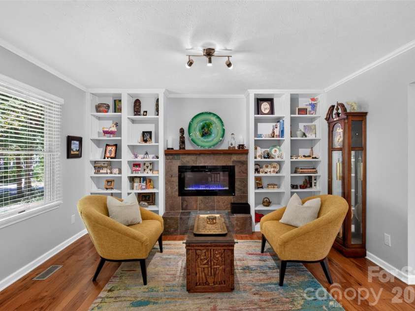 42 Timothy Lane, Candler, NC 28715.  MLS# CAR4419868, YatesRealty ID 47953. Nicely crafted built-in shelving