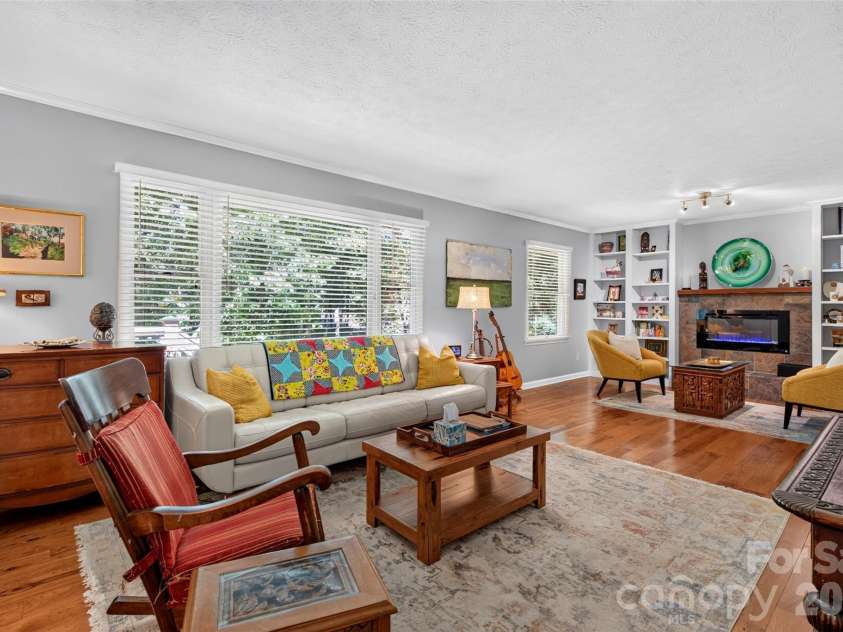 42 Timothy Lane, Candler, NC 28715.  MLS# CAR4419868, YatesRealty ID 47953. Spacious living room
