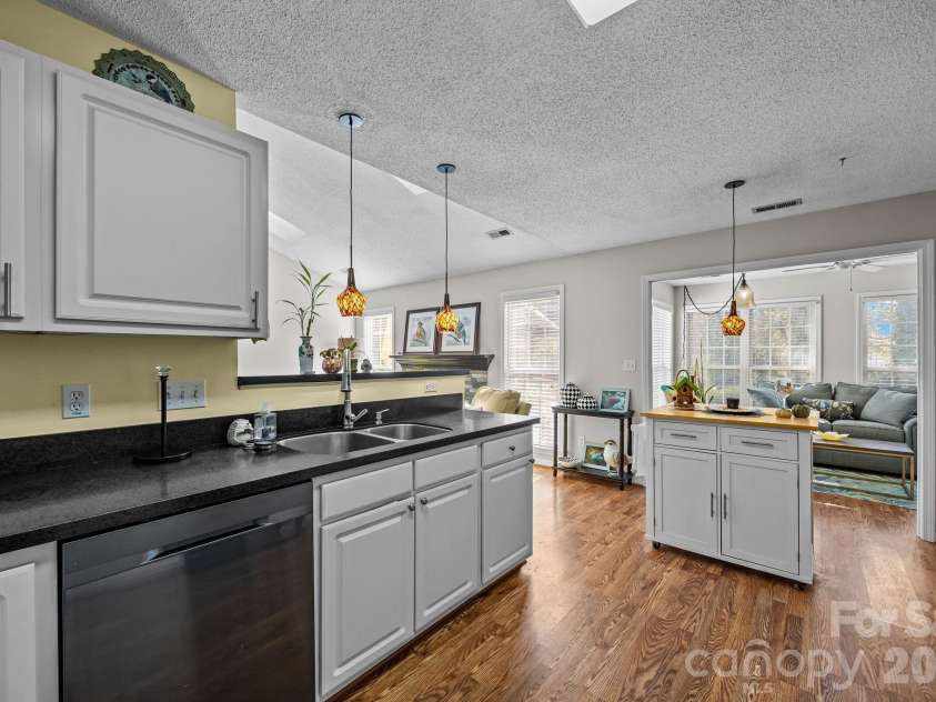255 Stonehollow Road, Fletcher, NC 28732.  MLS# CAR4320465, YatesRealty ID 4796. Open and cozy kitchen
