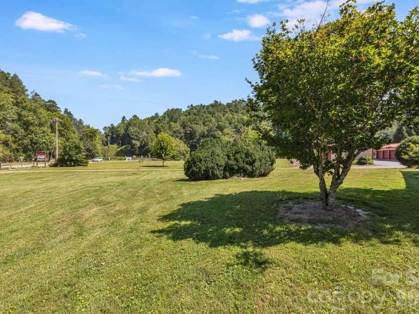 58 Guntertown Road, Marshall, NC 28753.  MLS# CAR4418094, YatesRealty ID 47965. Level Yard