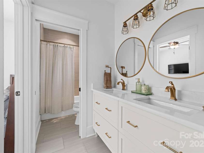 4554 Ina Lane, Sherrills Ford, NC 28673.  MLS# CAR4316368, YatesRealty ID 47991. Upper bathroom