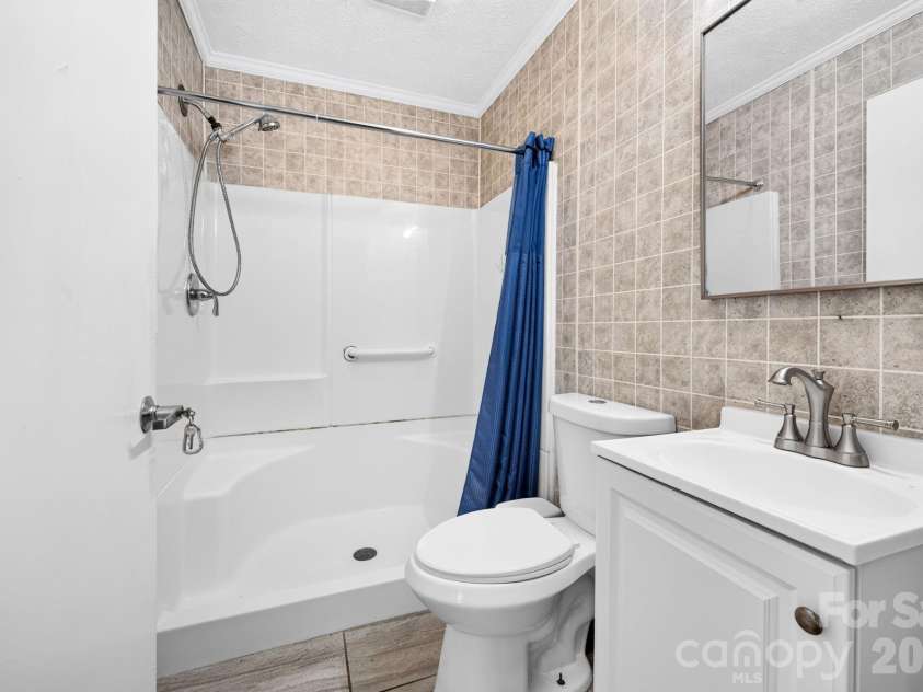 483 Caribou Road, Asheville, NC 28803.  MLS# CAR4417603, YatesRealty ID 47992. Bathroom 2