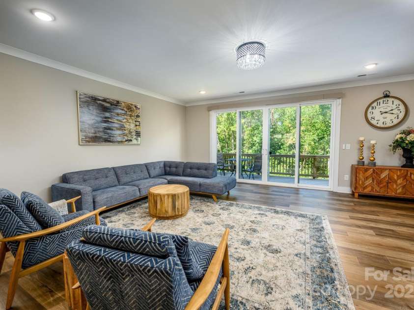 114 Glencoe Lane, Mooresville, NC 28117.  MLS# CAR4301819, YatesRealty ID 48. Great Room w/8 ft Sliders To Deck
