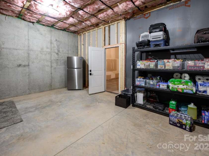 114 Glencoe Lane, Mooresville, NC 28117.  MLS# CAR4301819, YatesRealty ID 48. Unfinished Storage Area