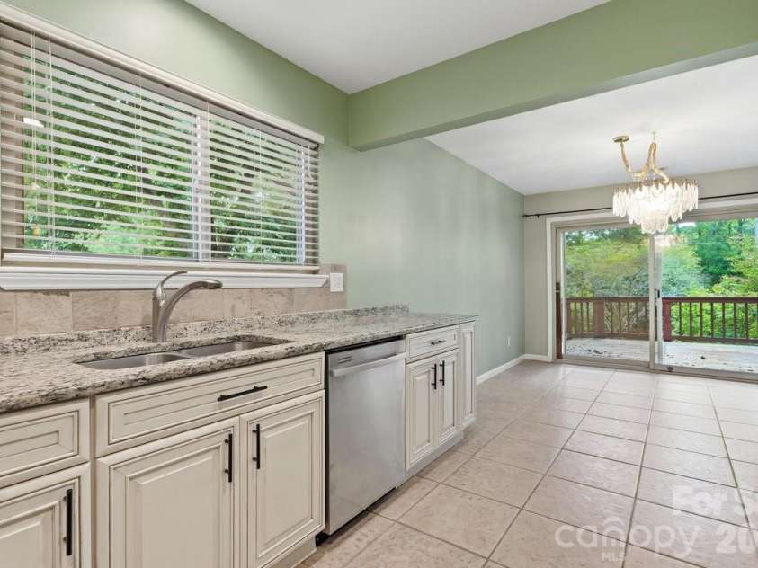 326 Vista Grande Circle, Charlotte, NC 28226.  MLS# CAR4418981, YatesRealty ID 48012. Window over sink lets light in