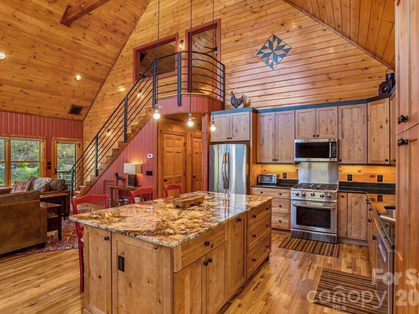 568 Auborn Trivette Road, Sugar Grove, NC 28679.  MLS# CAR4419786, YatesRealty ID 48028. A chef-worthy kitchen with granite counters.