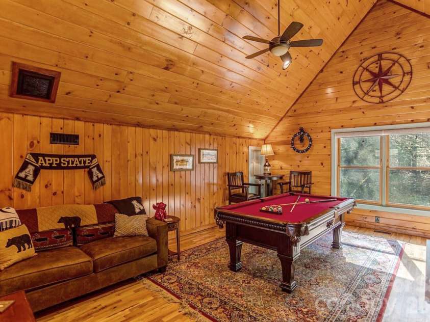 568 Auborn Trivette Road, Sugar Grove, NC 28679.  MLS# CAR4419786, YatesRealty ID 48028. Fully-equipped game room.