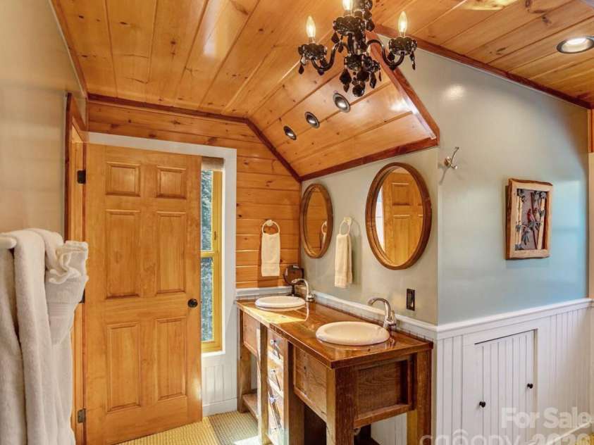 568 Auborn Trivette Road, Sugar Grove, NC 28679.  MLS# CAR4419786, YatesRealty ID 48028. Second full bathroom with double vanity.