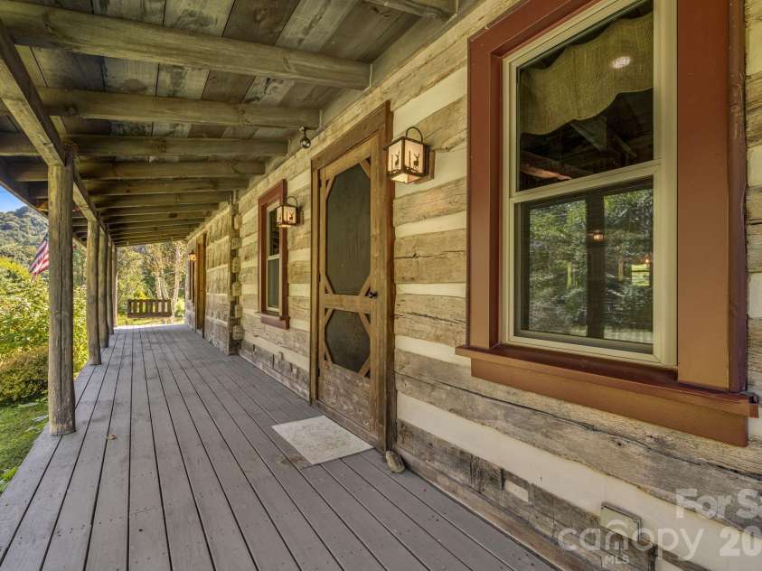 146 Gentry Farm Drive, Hot Springs, NC 28743.  MLS# CAR4419935, YatesRealty ID 48030. Front porch