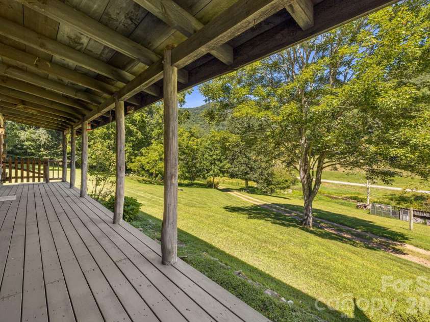 146 Gentry Farm Drive, Hot Springs, NC 28743.  MLS# CAR4419935, YatesRealty ID 48030. Front porch