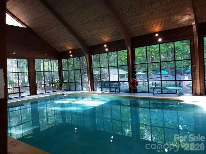 91 River Run, Sapphire, NC 28774.  MLS# CAR4417409, YatesRealty ID 48033. 
