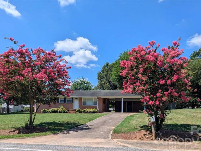 424 Bear Creek Road, Shelby, NC 28152.  MLS# CAR4419438, YatesRealty ID 48038. Beautiful trees in bloom!