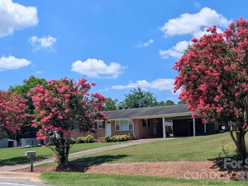 424 Bear Creek Road, Shelby, NC 28152.  MLS# CAR4419438, YatesRealty ID 48038. Pretty trees in bloom.