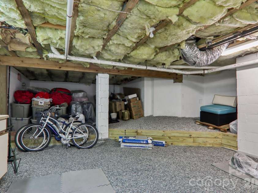 651 Park Place, Hendersonville, NC 28791.  MLS# CAR4415720, YatesRealty ID 48047. Walk in crawl space w/storage area