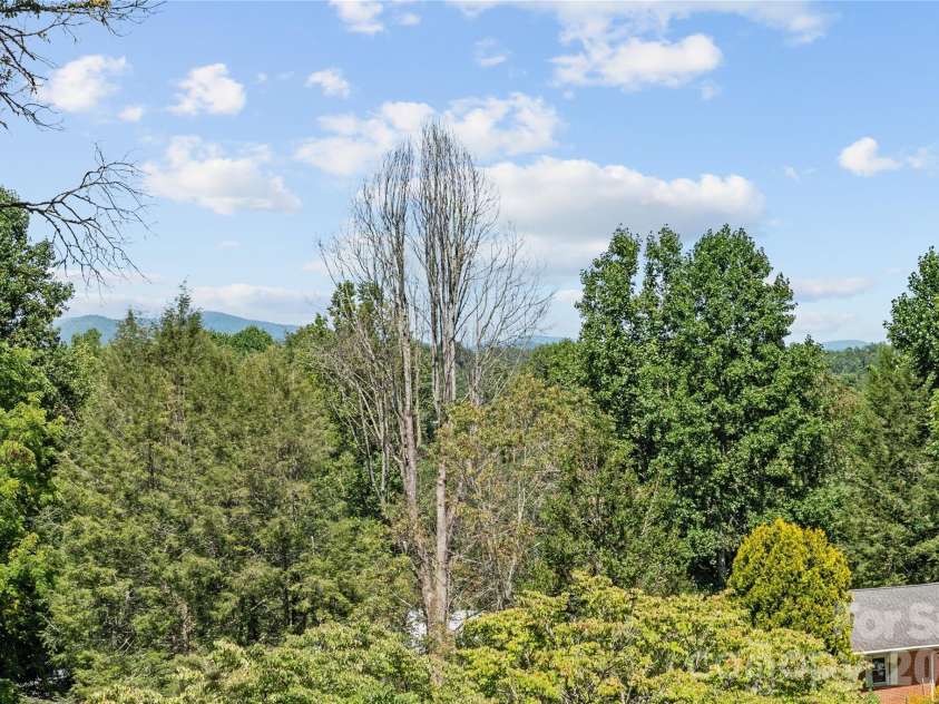 106 Holly Lane, Brevard, NC 28712.  MLS# CAR4420043, YatesRealty ID 48052. 