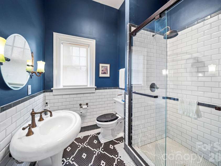 128 Thomas Street, Salisbury, NC 28144.  MLS# CAR4355129, YatesRealty ID 4806. Downstairs bathroom