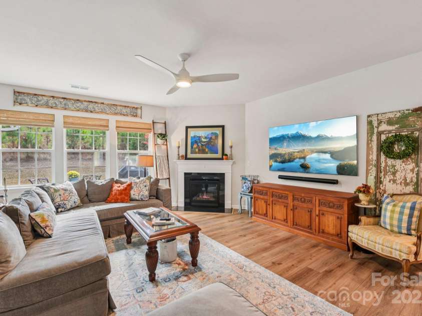 1328 Dali Boulevard, Mount Holly, NC 28120.  MLS# CAR4320263, YatesRealty ID 48061. Get cozy while enjoying a fire in the gas fireplace! A wall of windows brings in the light!