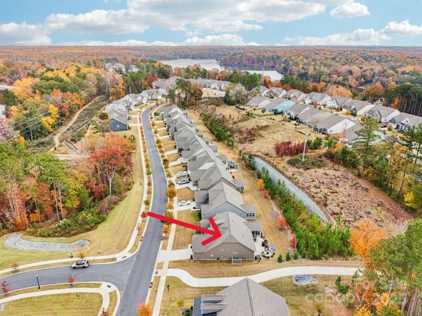 1328 Dali Boulevard, Mount Holly, NC 28120.  MLS# CAR4320263, YatesRealty ID 48061. The golf cart path in the foreground leads to the many amenities that Imagery offers its residents!