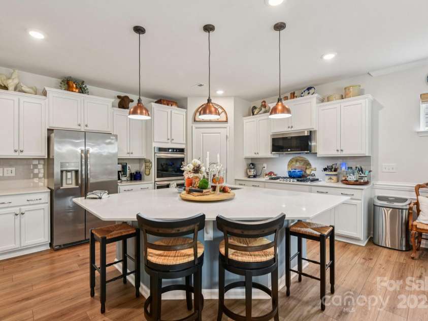 1328 Dali Boulevard, Mount Holly, NC 28120.  MLS# CAR4320263, YatesRealty ID 48061. White! Bright and filled with light - this gorgeous kitchen is the hub of the home!