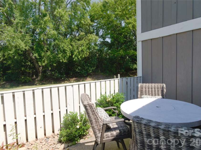 7615 Woods Lane, Cornelius, NC 28031.  MLS# CAR4419666, YatesRealty ID 48069. Back patio