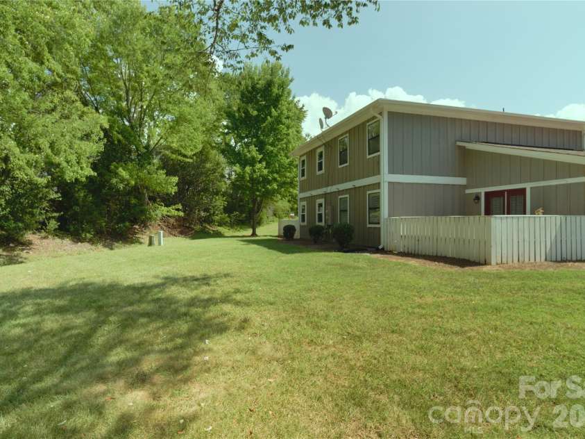 7615 Woods Lane, Cornelius, NC 28031.  MLS# CAR4419666, YatesRealty ID 48069. Back yard area