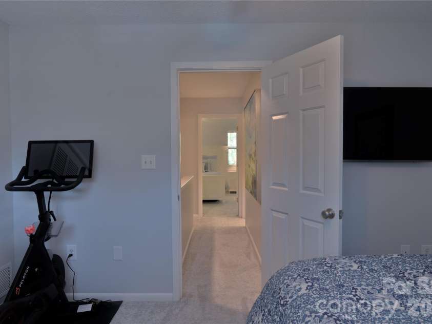 7615 Woods Lane, Cornelius, NC 28031.  MLS# CAR4419666, YatesRealty ID 48069. Bedroom 3 upstairs