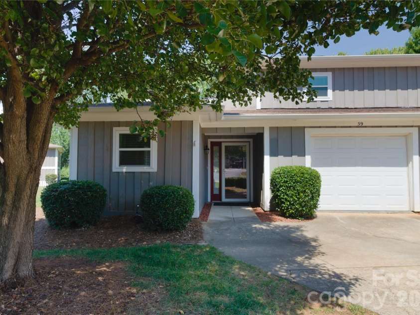 7615 Woods Lane, Cornelius, NC 28031.  MLS# CAR4419666, YatesRealty ID 48069. Front of home