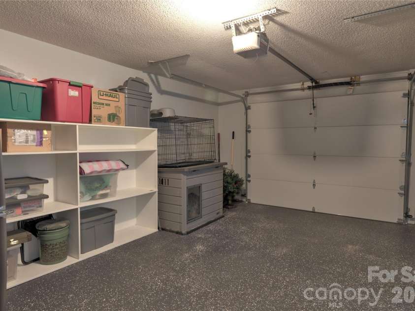7615 Woods Lane, Cornelius, NC 28031.  MLS# CAR4419666, YatesRealty ID 48069. Inside garage