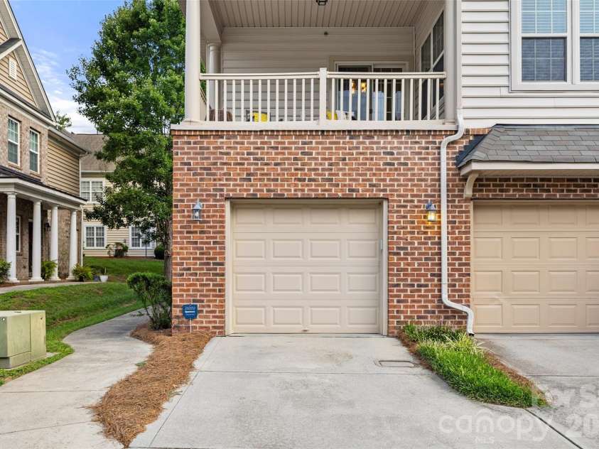 11123 Ascoli Place, Charlotte, NC 28277.  MLS# CAR4419358, YatesRealty ID 48071. One car garage and balcony above