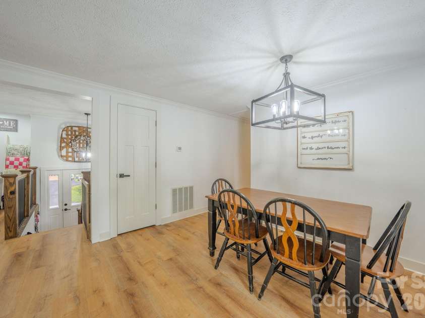 38 Ferenvilla Drive, Hendersonville, NC 28791.  MLS# CAR4416441, YatesRealty ID 48072. Dining area- view from kitchen