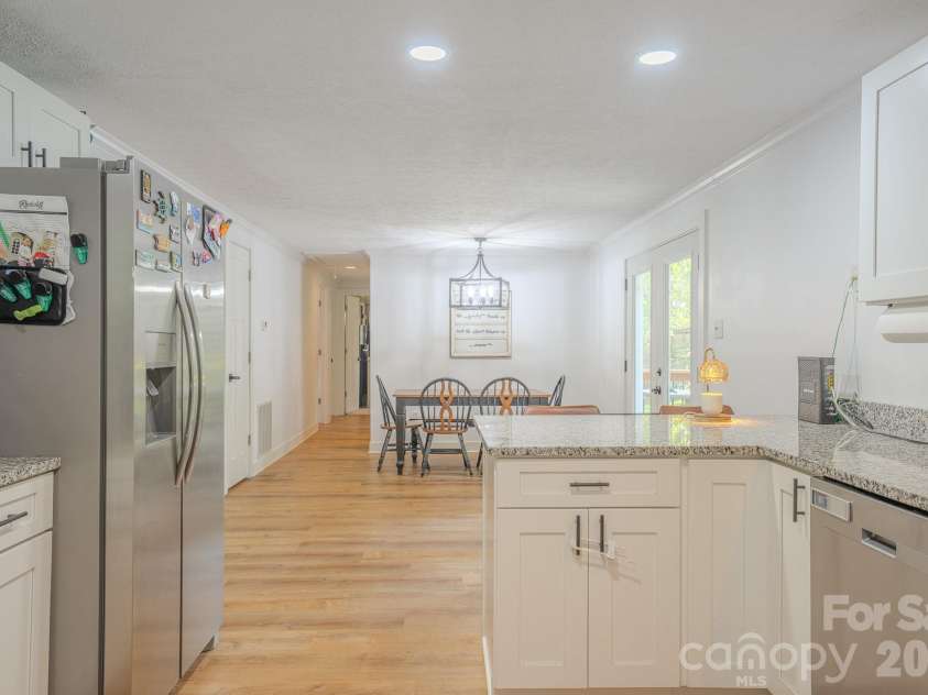 38 Ferenvilla Drive, Hendersonville, NC 28791.  MLS# CAR4416441, YatesRealty ID 48072. Great kitchen space- light and bright