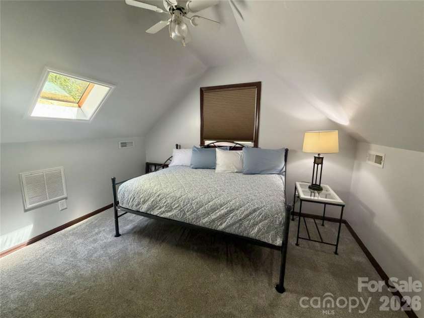 188 Forest Lane, Blowing Rock, NC 28605.  MLS# CAR4419824, YatesRealty ID 48074. Upstairs BR #2 with vaulted ceiling