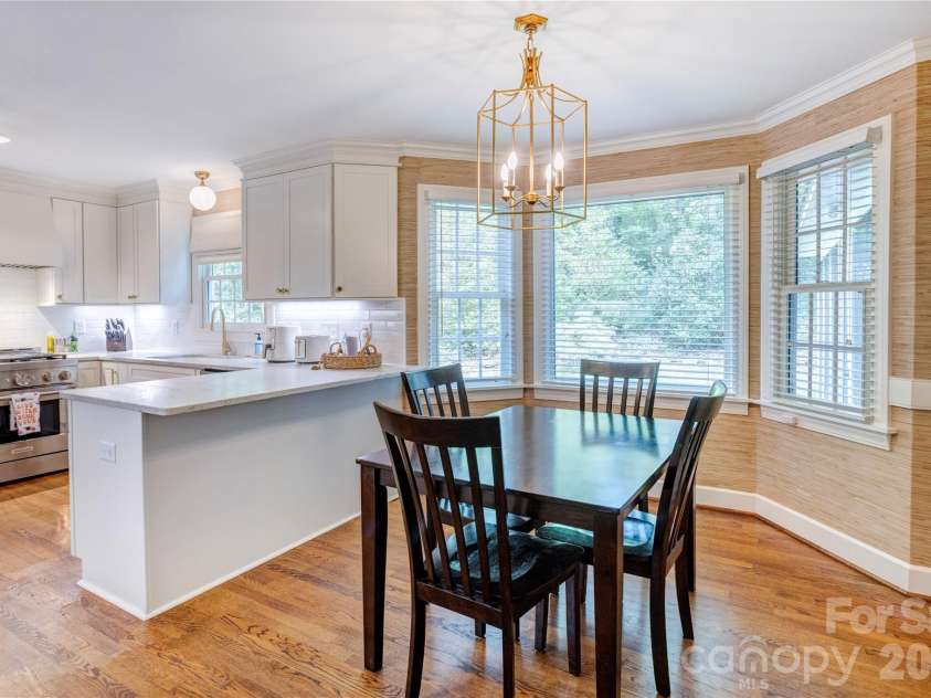 215 Bethel Drive, Salisbury, NC 28144.  MLS# CAR4419558, YatesRealty ID 48077. A cozy breakfast nook, ideal for easing into your morning.