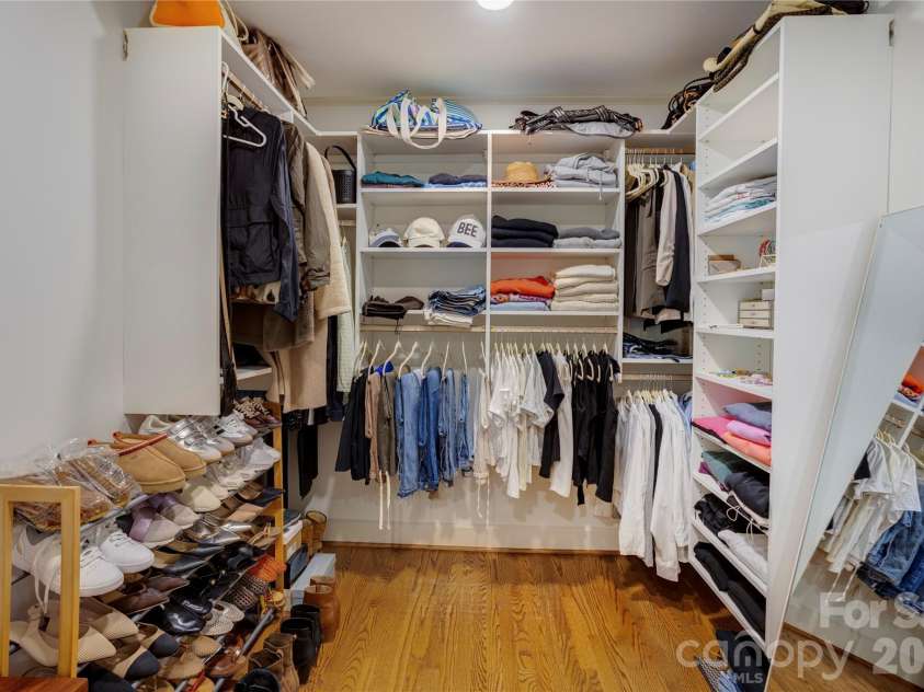 215 Bethel Drive, Salisbury, NC 28144.  MLS# CAR4419558, YatesRealty ID 48077. A custom walk in closet, designed and built by Closet Maker Man.