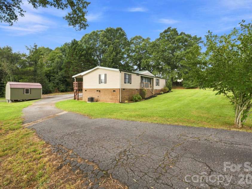 8099 River Bend Drive, Claremont, NC 28610.  MLS# CAR4414907, YatesRealty ID 48093. 