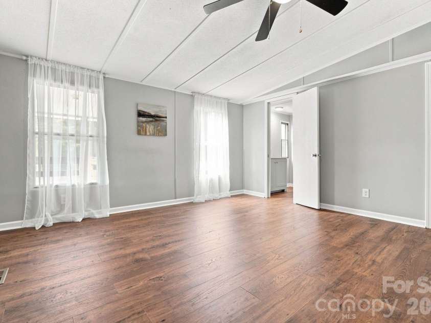 8099 River Bend Drive, Claremont, NC 28610.  MLS# CAR4414907, YatesRealty ID 48093. Primary Bedroom