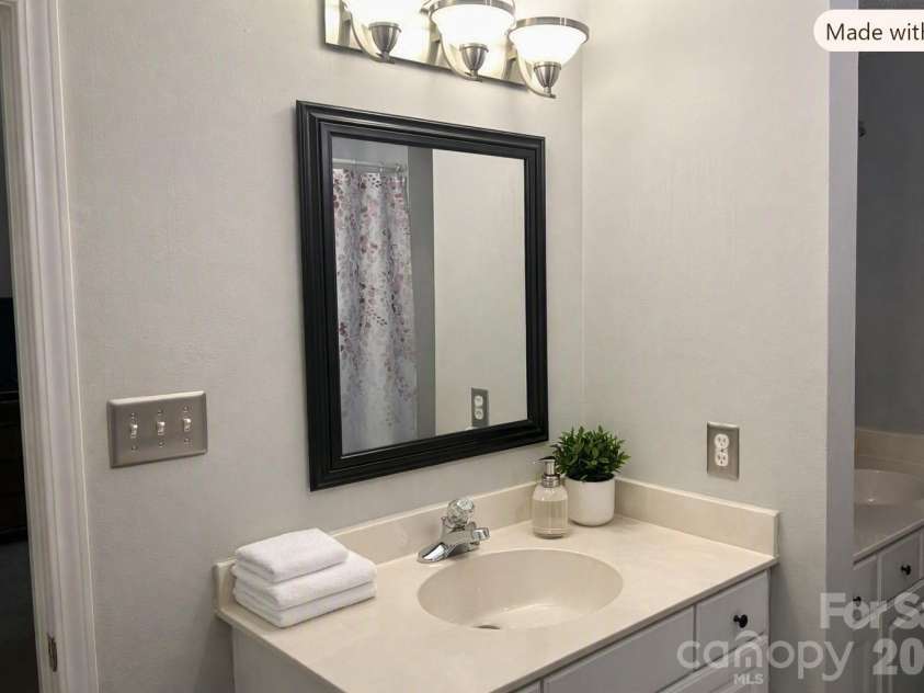 9206 Rotherham Lane, Charlotte, NC 28216.  MLS# CAR4419892, YatesRealty ID 48102. Digitally enhanced double vanities
