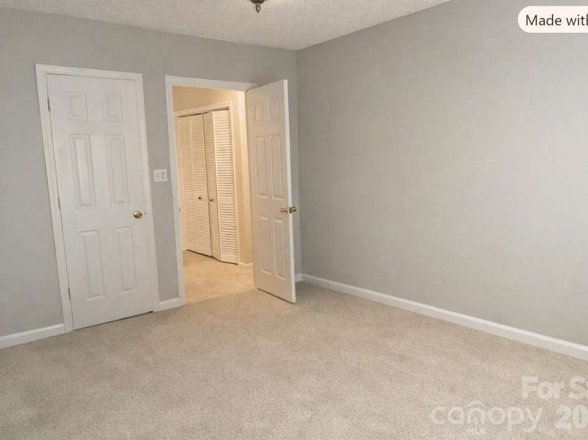 9206 Rotherham Lane, Charlotte, NC 28216.  MLS# CAR4419892, YatesRealty ID 48102. Empty bedroom